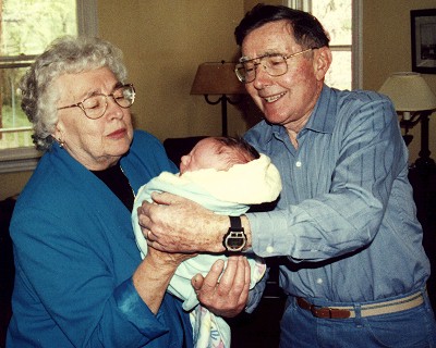 Grandparents Marion and Dick Rarey coo to Adam